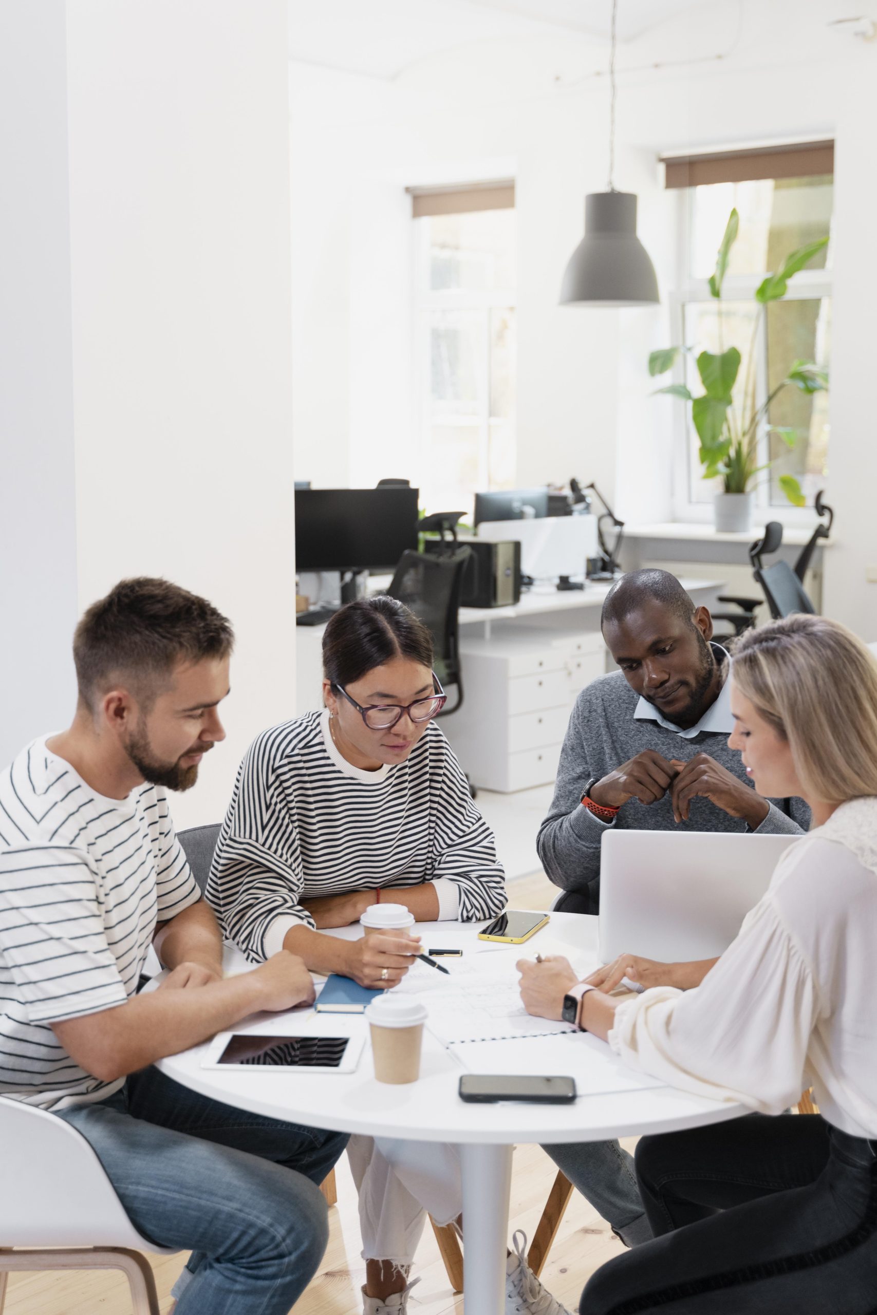 close-up-young-colleagues-having-meeting